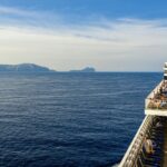 Sunny day on a cruise ship off the coast of Mallorca, Spain, overlooking the Mediterranean Sea.
