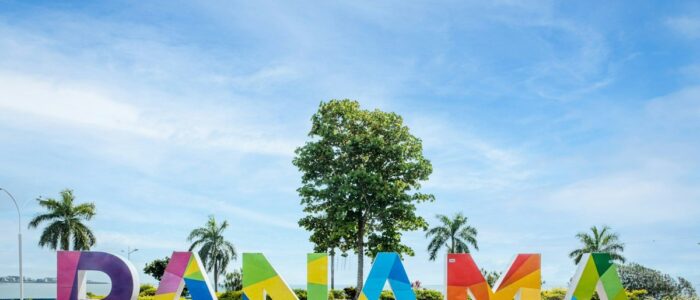 a large sign that says danama in multicolored letters